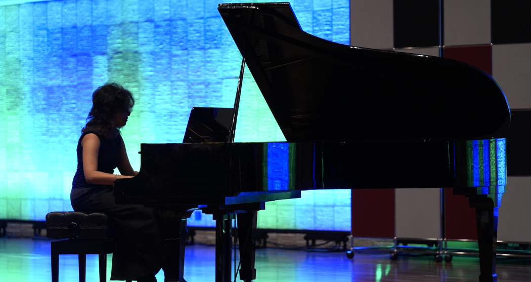 Player on grand piano